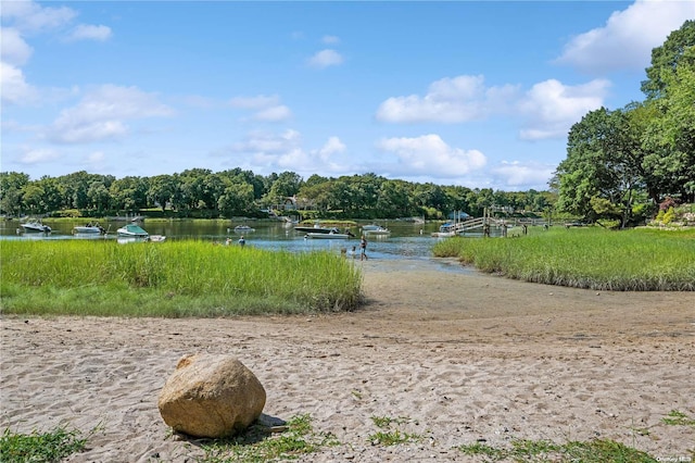 view of property's community featuring a water view