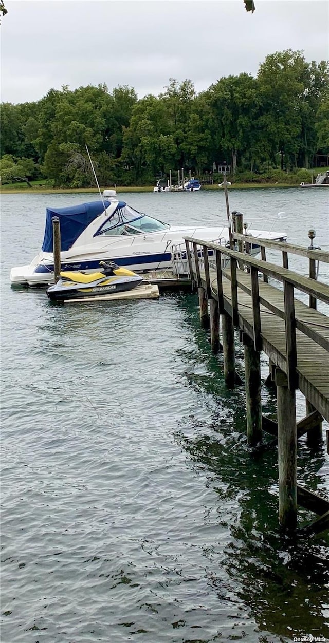 18 Cedar Ln, Setauket, NY 11733 - dock area featuring a water view and a view of trees