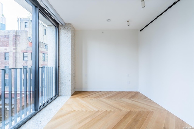 spare room with parquet floors