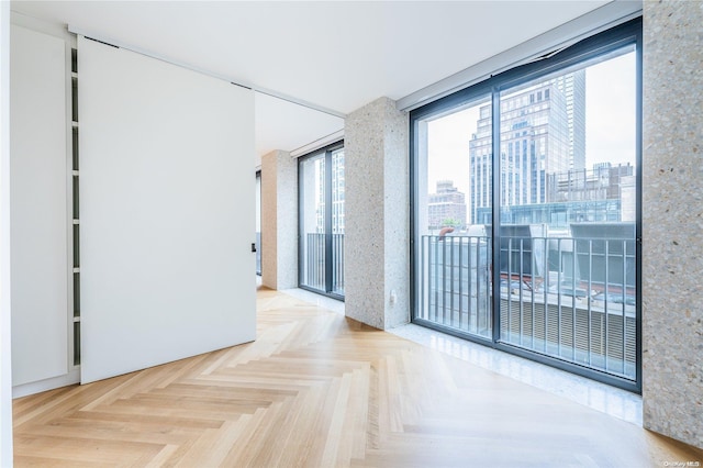 spare room with parquet flooring