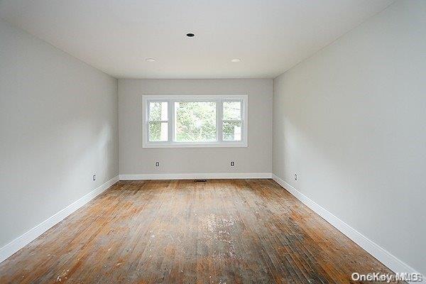 empty room with light wood-type flooring