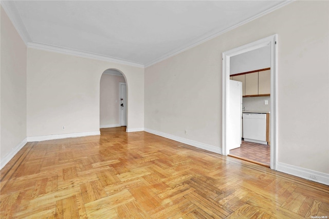 unfurnished room with light parquet flooring and crown molding