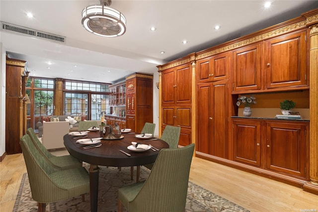 dining room featuring light hardwood / wood-style floors