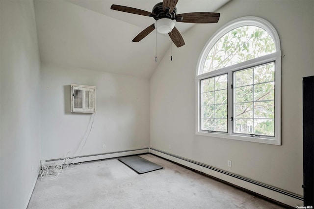 carpeted empty room featuring ceiling fan and vaulted ceiling