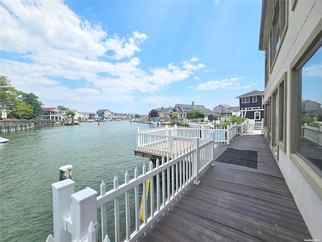 dock area with a water view