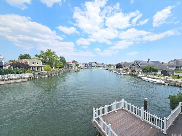 view of dock with a water view