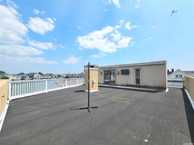 view of patio featuring a water view