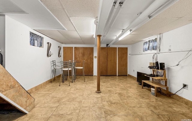 basement with a drop ceiling