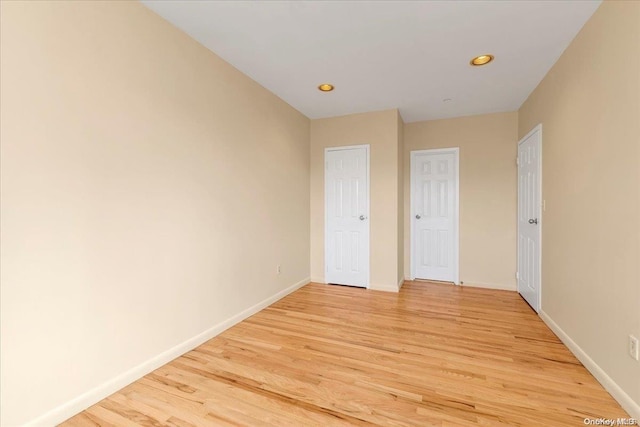 unfurnished bedroom with light hardwood / wood-style floors