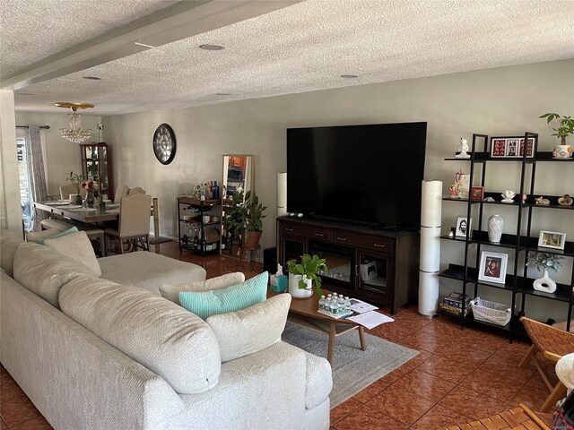 tiled living room featuring a textured ceiling