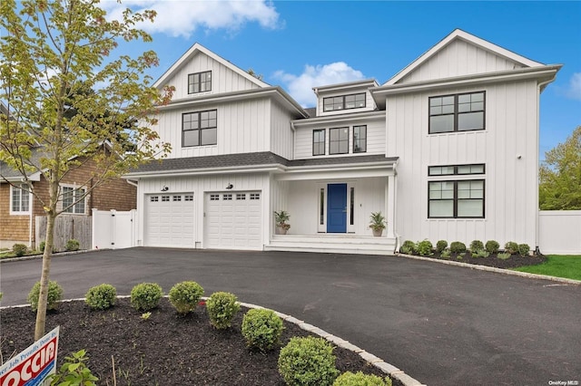 modern farmhouse with a garage