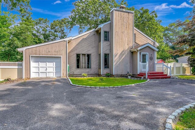 view of property exterior featuring a garage