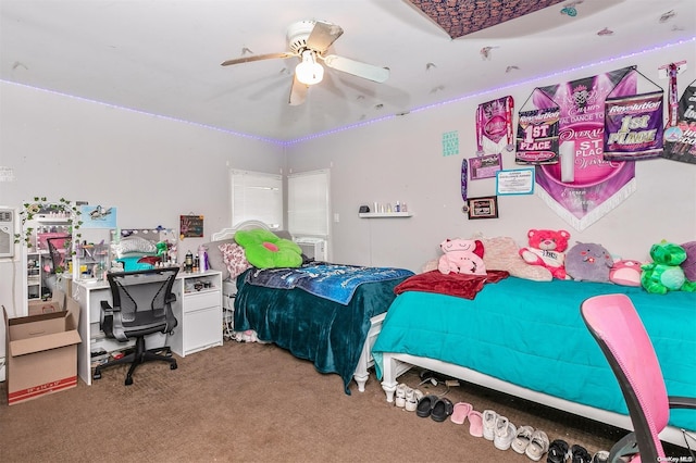 carpeted bedroom featuring ceiling fan