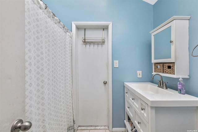 bathroom featuring vanity and walk in shower