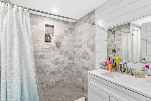 bathroom with vanity and walk in shower