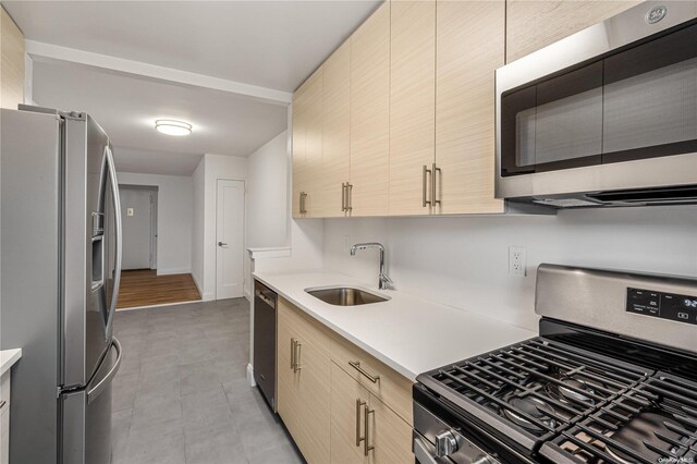 kitchen featuring sink and appliances with stainless steel finishes