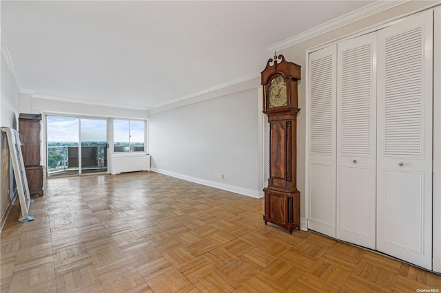 unfurnished living room with crown molding and light parquet floors