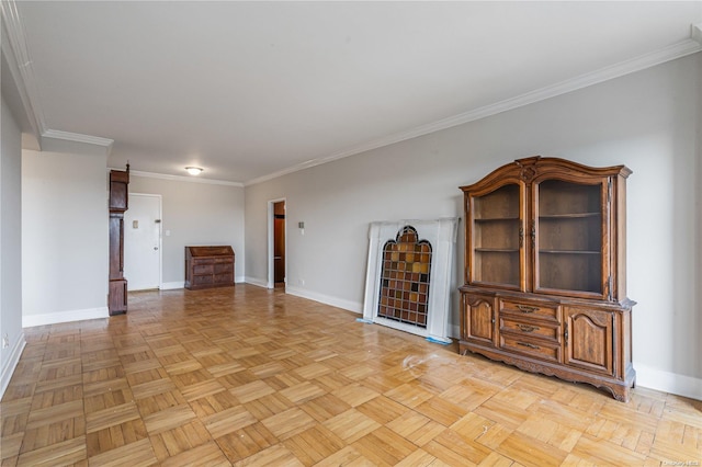 unfurnished living room featuring light parquet flooring and ornamental molding