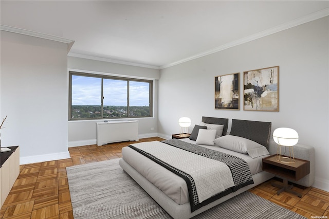 bedroom with radiator heating unit, ornamental molding, and parquet floors