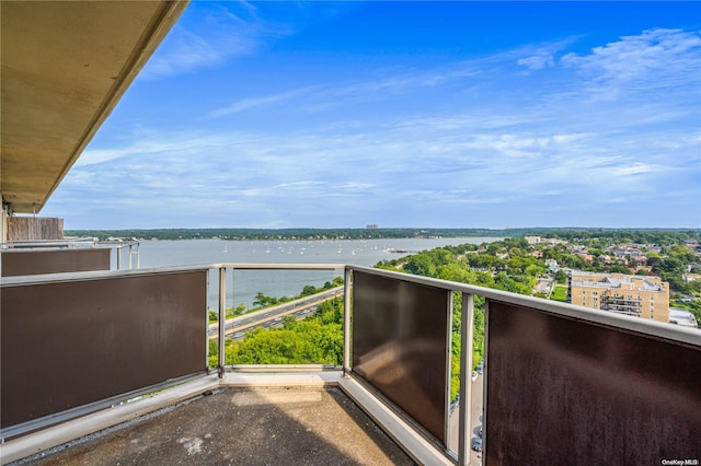 balcony featuring a water view