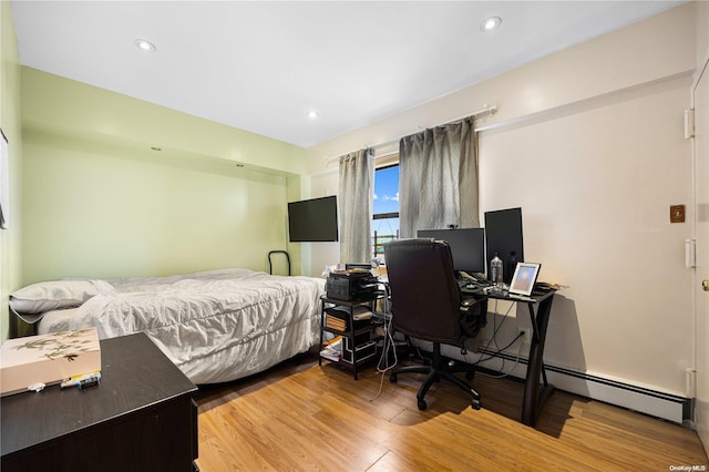 bedroom featuring wood-type flooring