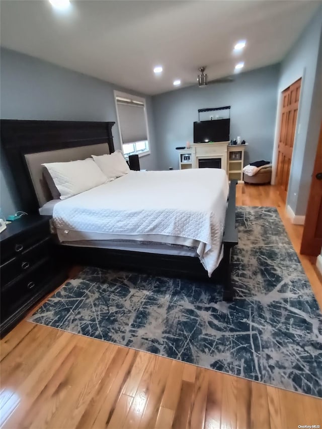 bedroom featuring hardwood / wood-style floors