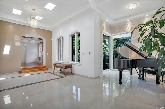 misc room with an inviting chandelier and crown molding