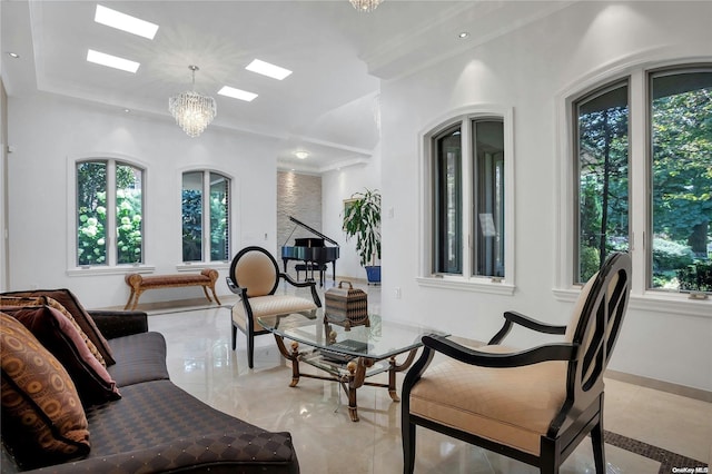 living room featuring a healthy amount of sunlight and an inviting chandelier