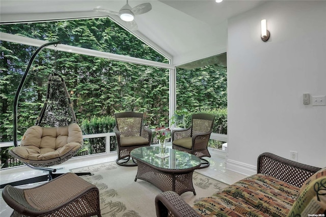 sunroom / solarium with vaulted ceiling and ceiling fan