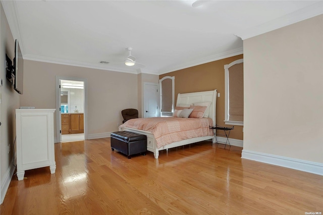 bedroom featuring light hardwood / wood-style floors, ceiling fan, and ornamental molding