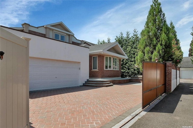 view of front of home with a garage