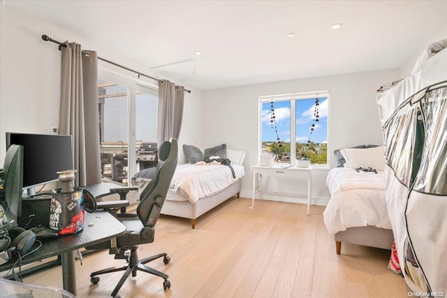 bedroom featuring light hardwood / wood-style floors