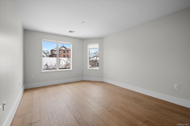 empty room featuring light wood-type flooring