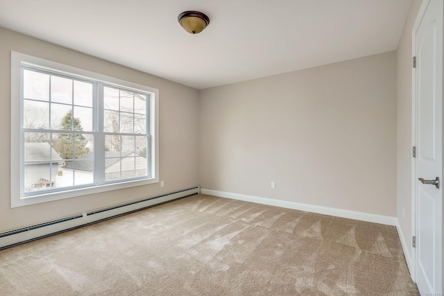 empty room featuring carpet and baseboard heating