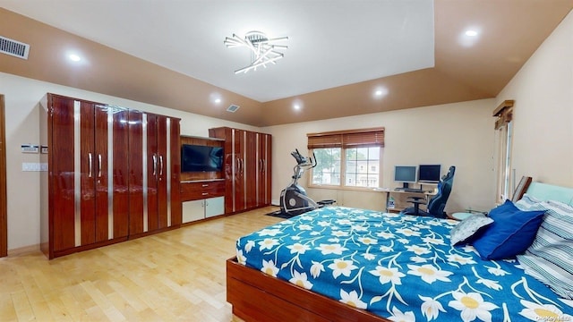 bedroom with light hardwood / wood-style floors