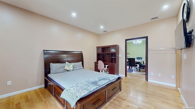 bedroom featuring light wood-type flooring