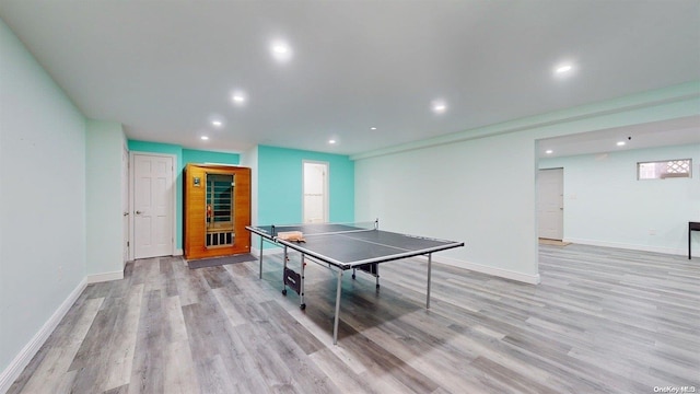 recreation room featuring plenty of natural light and light wood-type flooring