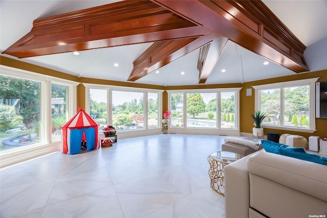 living room with lofted ceiling with beams