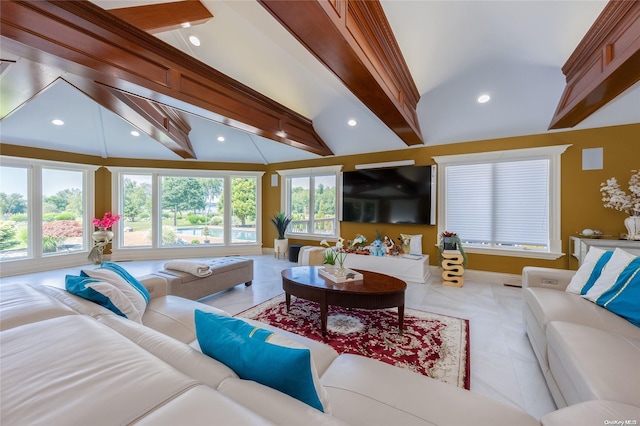 tiled living room featuring a healthy amount of sunlight and lofted ceiling with beams