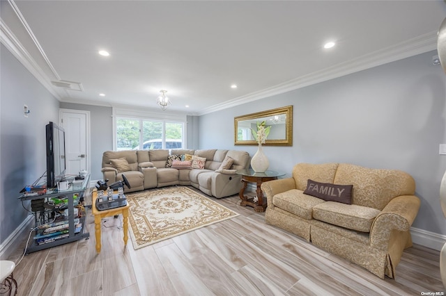 living room with light wood-type flooring and crown molding