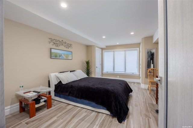 bedroom with light wood-type flooring