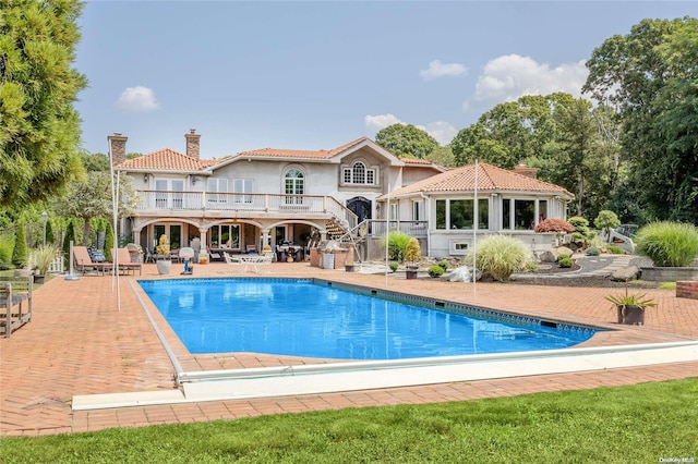 rear view of house with a patio area