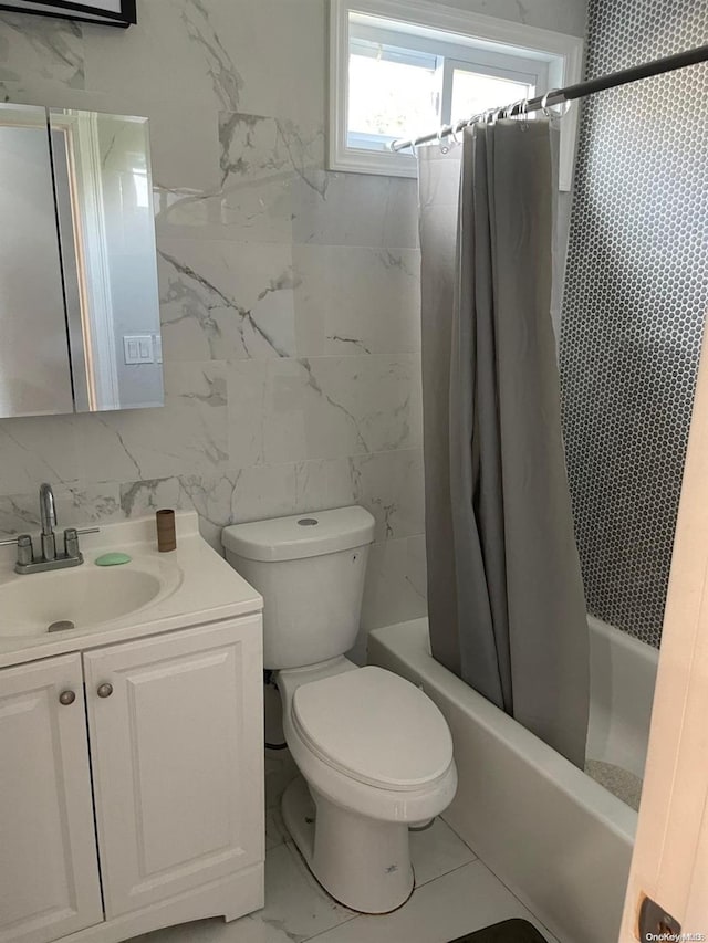 full bathroom featuring shower / bathtub combination with curtain, vanity, tile walls, and toilet