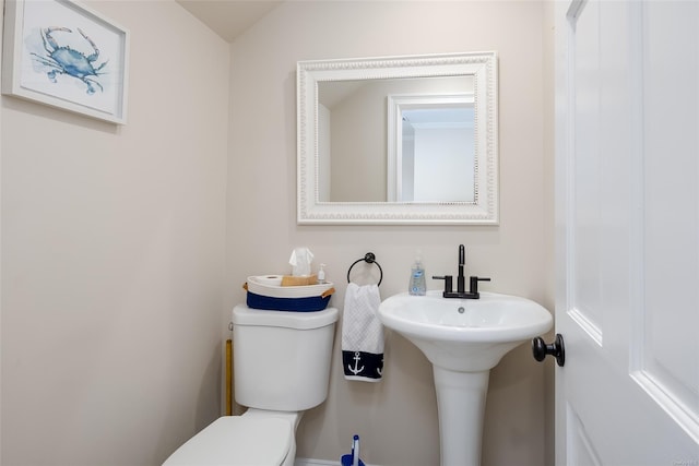 bathroom featuring toilet