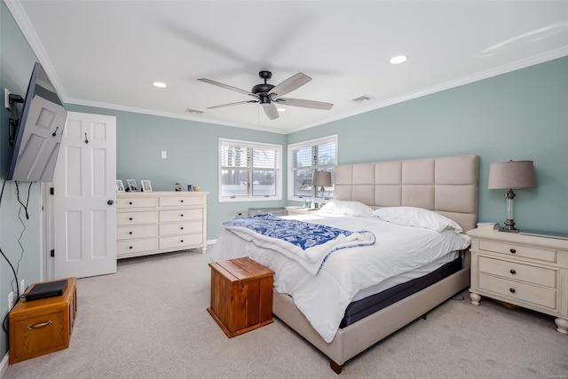 carpeted bedroom with crown molding and ceiling fan