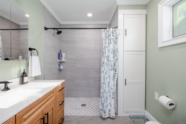 bathroom featuring tile patterned flooring, crown molding, vanity, and a shower with shower curtain