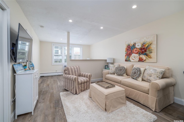 living room featuring hardwood / wood-style floors and baseboard heating