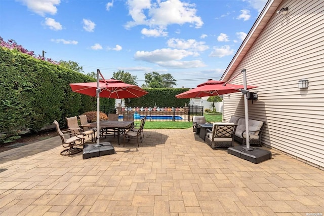 view of patio featuring a swimming pool