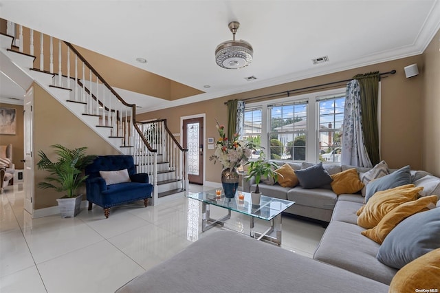 tiled living room featuring ornamental molding