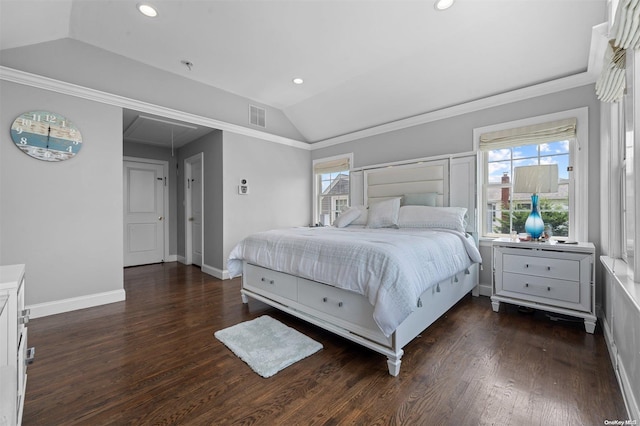 bedroom featuring crown molding, dark wood-type flooring, and lofted ceiling